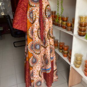 robe longue asymétrique aux tons cuivrés